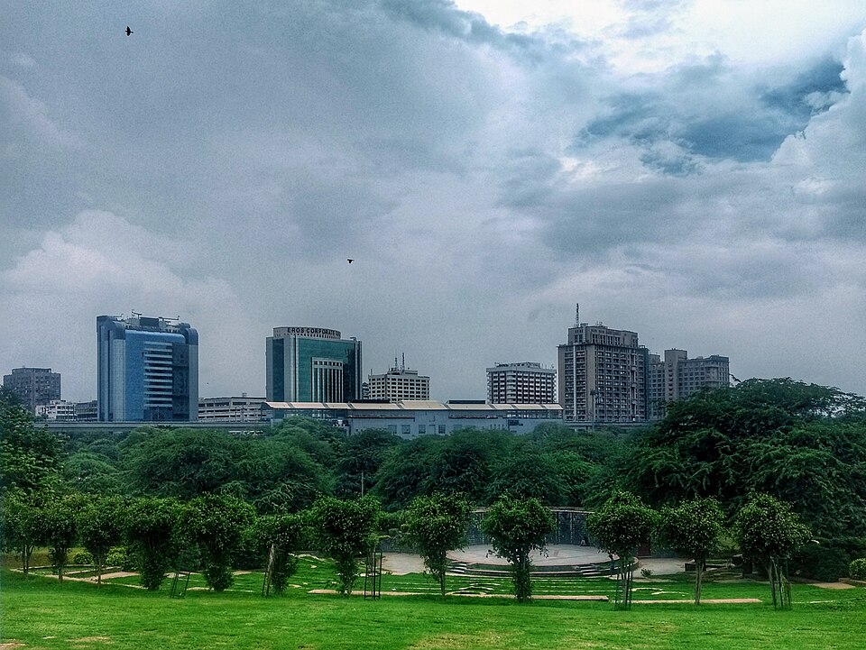 Delhi skyline beside green parkland